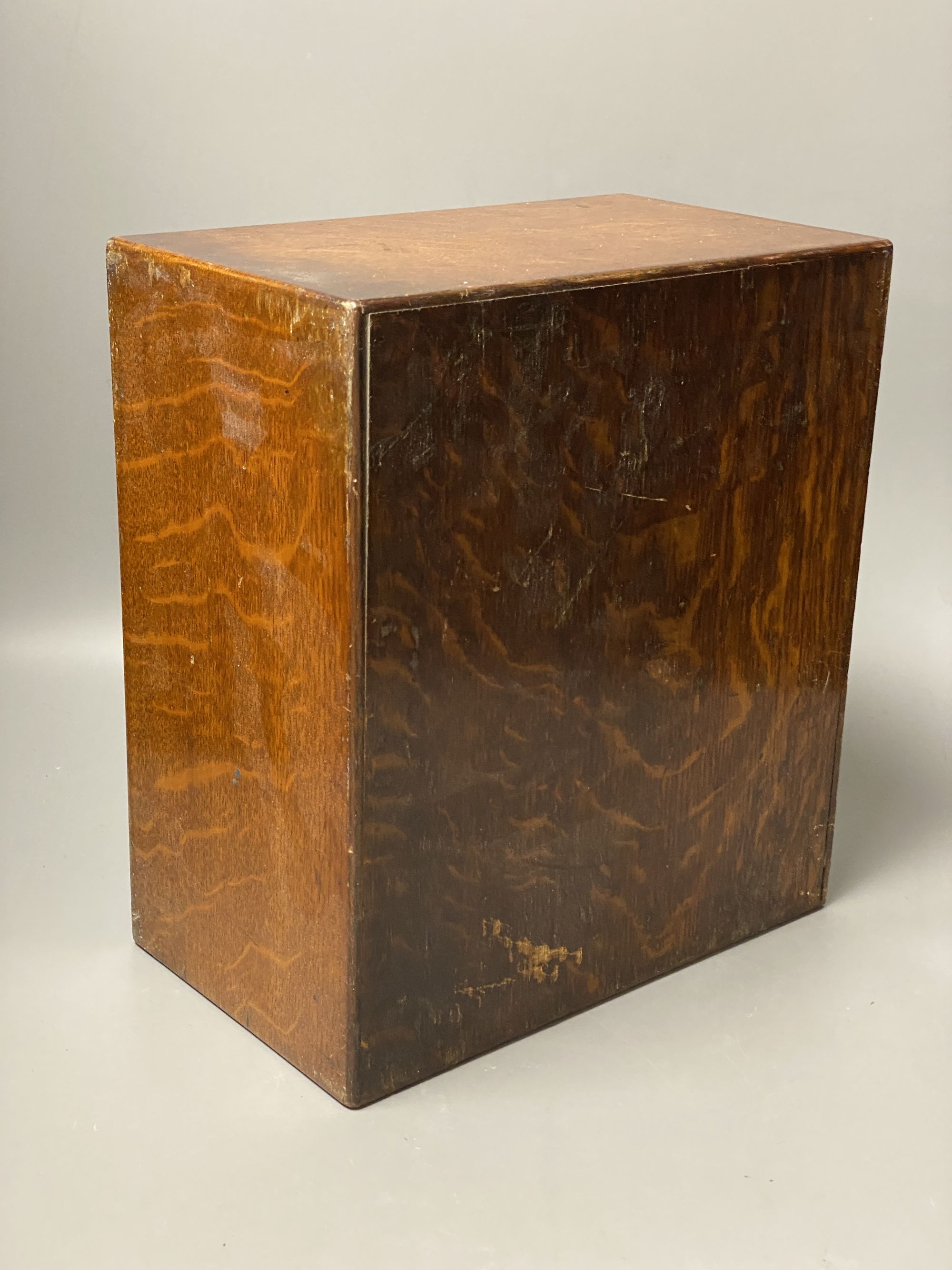 An Edwardian oak stationery box, height 29cm